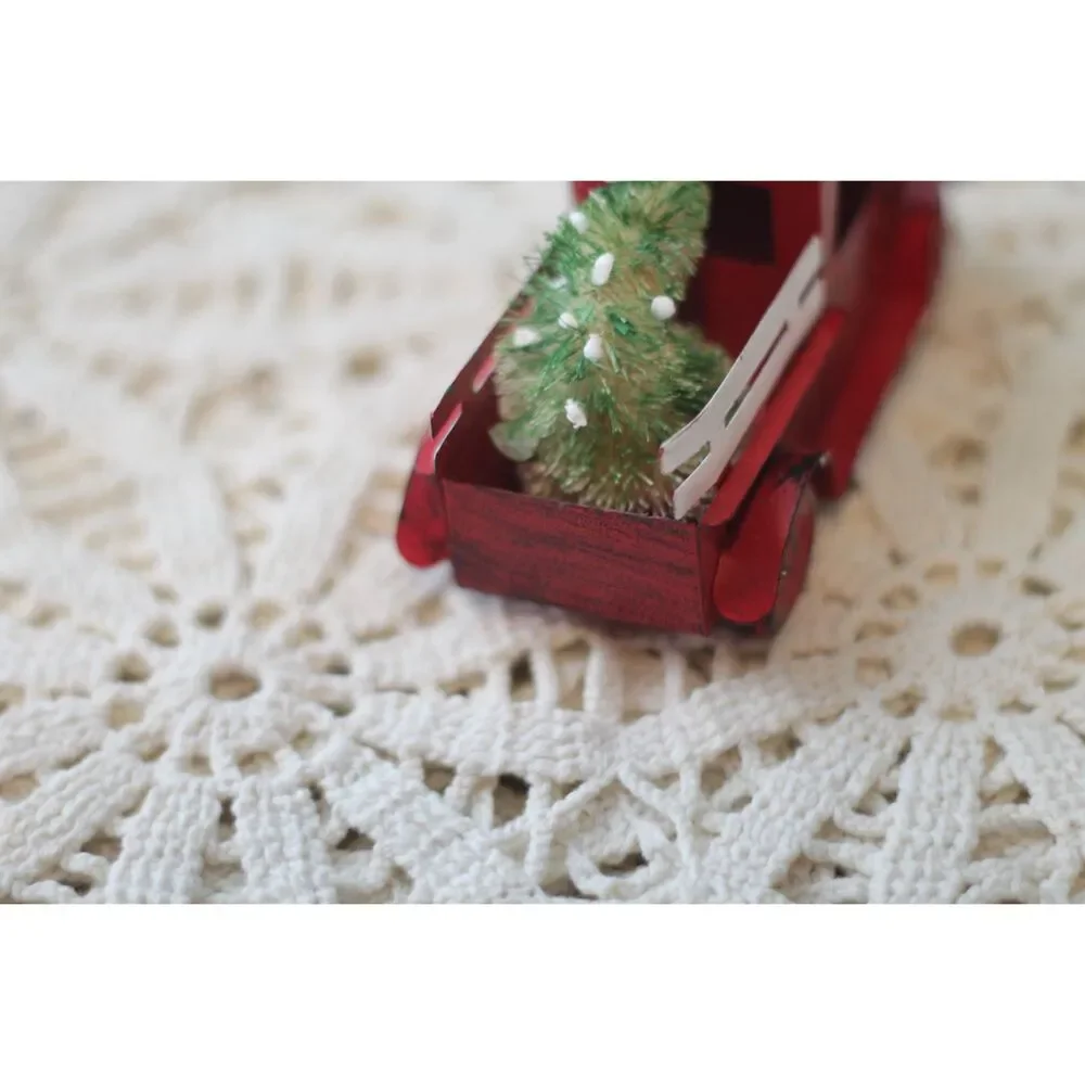 farmhouse style Christmas ornament with vintage style red pickup truck and tree